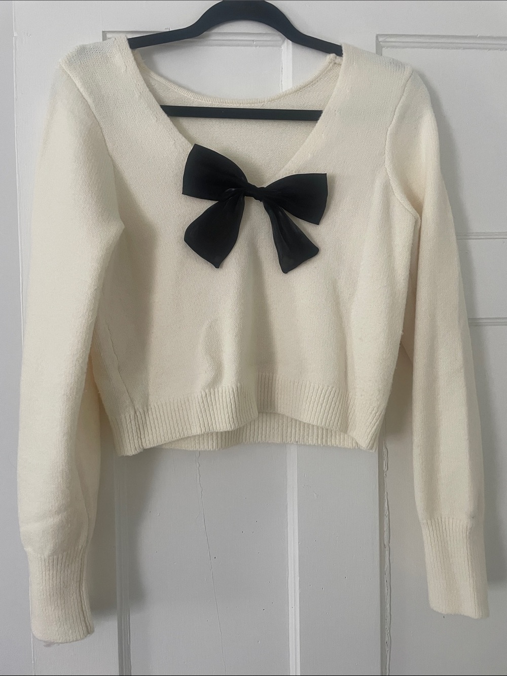 SHEIN Cream V-Neck Sweater with Black Bow